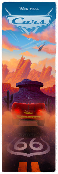 A framed art print featuring Lightning McQueen from the movie Cars, driving into a sunset landscape.