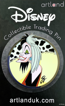 A collectible trading pin featuring an illustration of Cruella De Vil, with the signature of the artist, Guy Vasilovich.