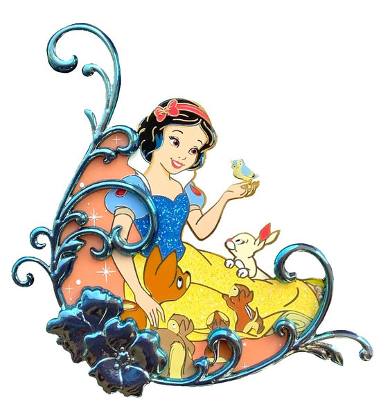 a disney pin of snow white. snow white is surrounded by a filigree floral design.